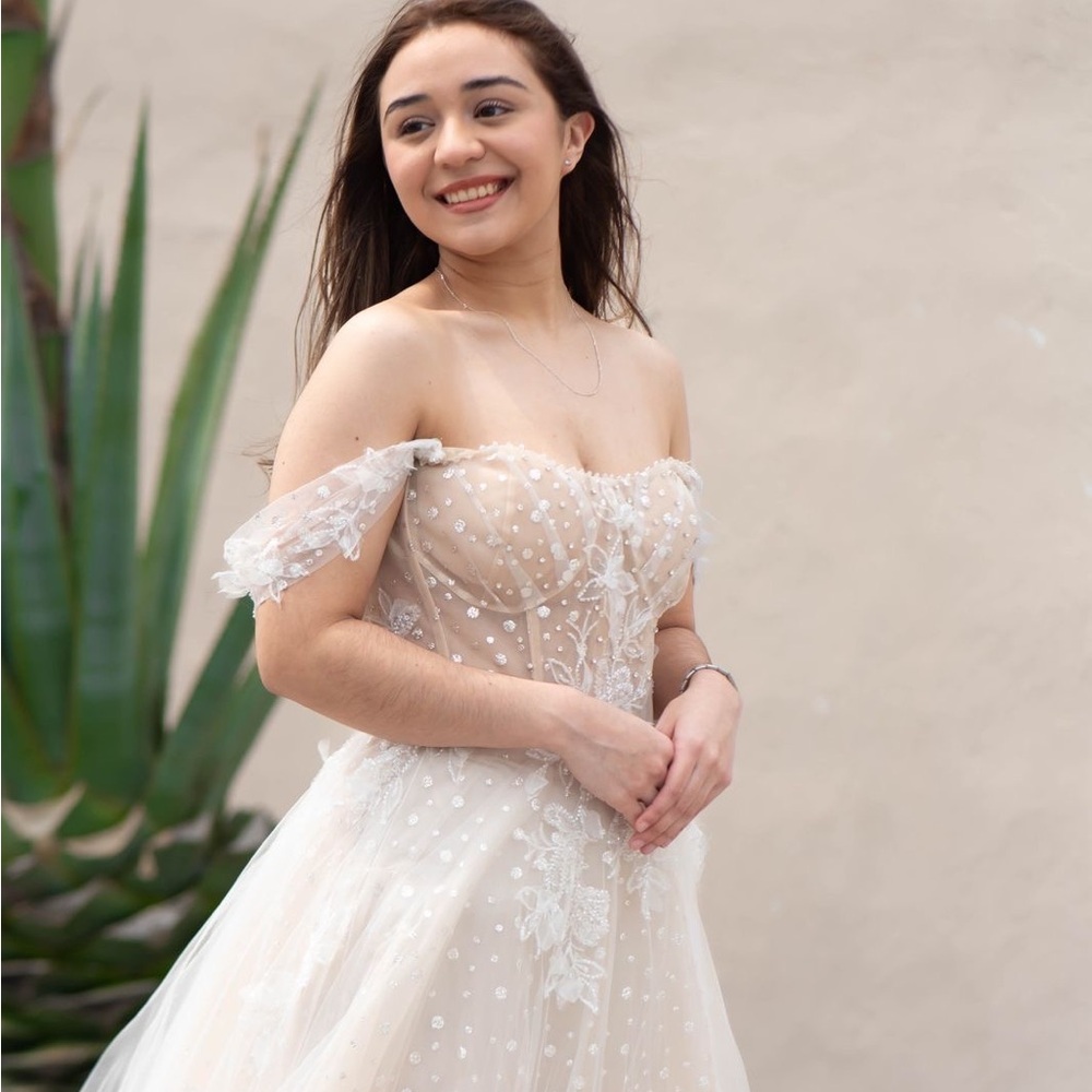 Elegant Cream Off-Shoulder Wedding Dress